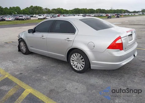 2012 Ford Fusion Hybrid z USA, uszkodzony, nr VIN 3FADP0L35CR281029